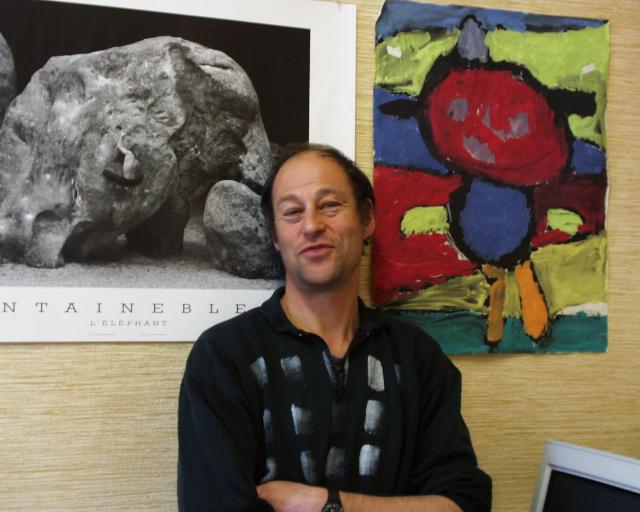 Marc Shapiro with L'Éléphant and kid's painting in background